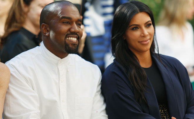 Recording artist Kanye West (L) and TV personality Kim Kardashian attend CFDA/Vogue Fashion Fund Show and Tea at Chateau Marmont on October 20, 2015 in Los Angeles, California. (Getty images)