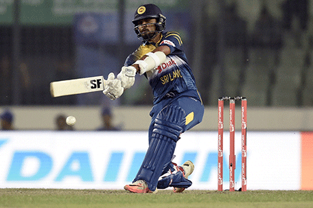 Sri Lanka cricketer Dinesh Chandimal plays a shot during the match between Sri Lanka and United Arab Emirates at the Asia Cup T20 cricket tournament at the Sher-e-Bangla National Cricket Stadium in Dhaka on February 25, 2016. AFP