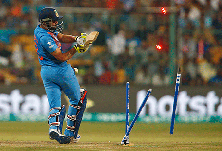 India's Ravindra Jadeja is bowled by Bangladesh's Mustafizur Rahman.  REUTERS