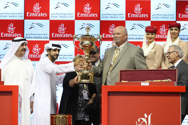 Hamdan bin Mohammed presents Dubai World Cup to owner of winning horse of the world's richest race (Wam)