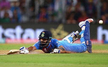 Virat Kohli of India dives to make his ground during the ICC World Twenty20 India 2016 Semi Final match between West Indies and India at Wankhede Stadium on March 31, 2016 in Mumbai, India. (Getty Images)