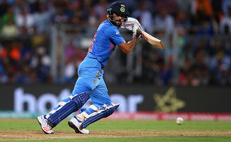 Virat Kohli of India dives to make his ground during the ICC World Twenty20 India 2016 Semi Final match between West Indies and India at Wankhede Stadium on March 31, 2016 in Mumbai, India. (Getty Images)