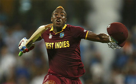 West Indies Andre Russell celebrates after winning their match. (Reuters)