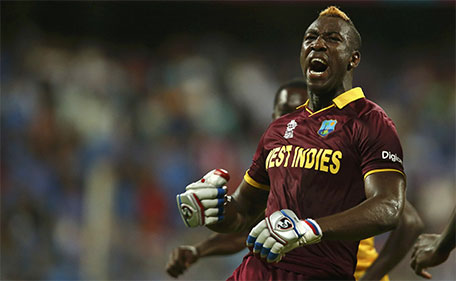 West Indies Andre Russell celebrates after winning their match. (Reuters)