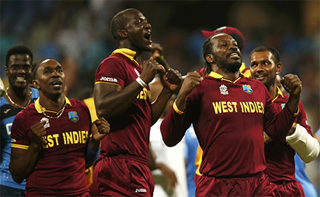 West Indies players celebrate after winning their match. (Reuters)