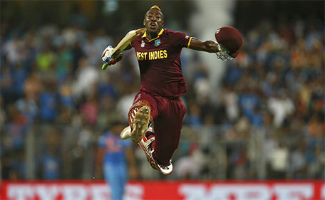 West Indies Andre Russell celebrates after winning their match.  (Reuters)