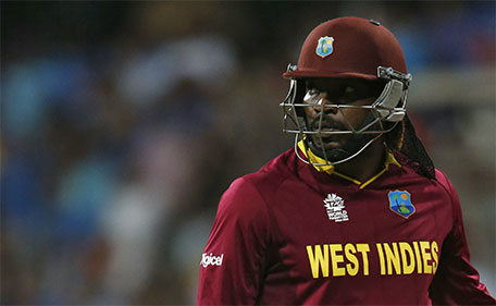 West Indies Chris Gayle walks off the field after his dismissal. (Reuters)