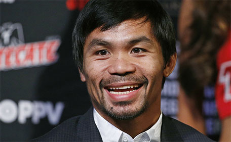 Manny Pacquiao reacts during a news conference Wednesday, April 6, 2016, in Las Vegas. (AP)