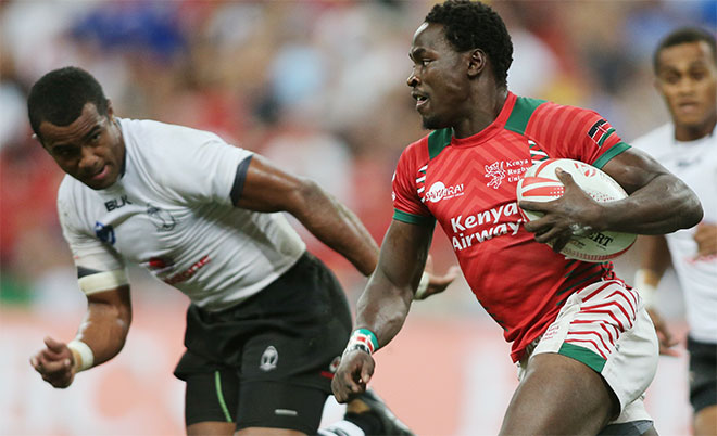 Kenya's Oscar Ayodi runs through to score a try during the Cup Final. (Reuters)
