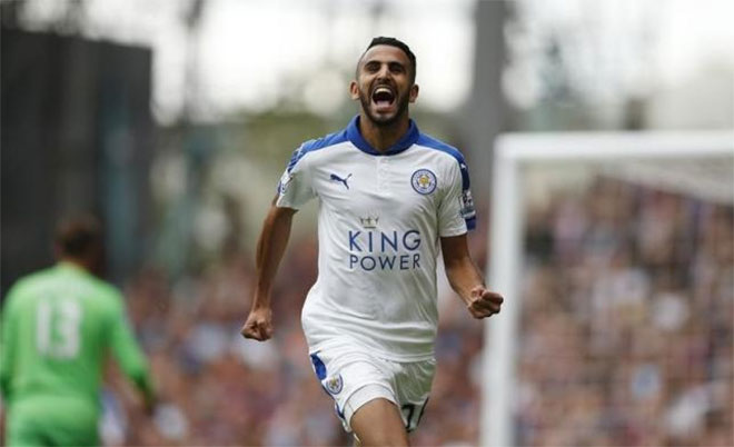 Riyad Mahrez celebrates scoring the second goal for Leicester against West Ham United during Barclays Premier League at Upton Park on 15/8/15. (Action Images)