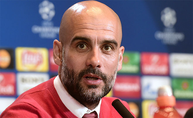 Bayern Munich's Spanish coach Josep Guardiola gives a press conference at the Vicente Calderon stadium in Madrid on April 26, 2016 on the eve of their UEFA Champions League semi-final first leg football match Club Atletico de Madrid vs Bayern Munich. (AFP)