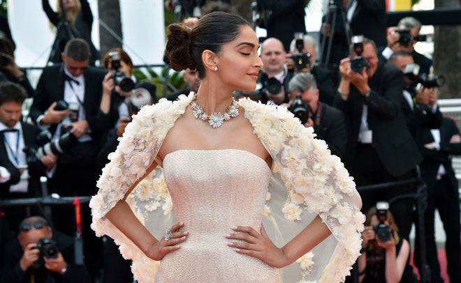 Indian actress Sonam Kapoor poses as she arrives on May 16, 2016 for the screening of the film 'Loving' at the 69th Cannes Film Festival in Cannes, southern France. (AFP)