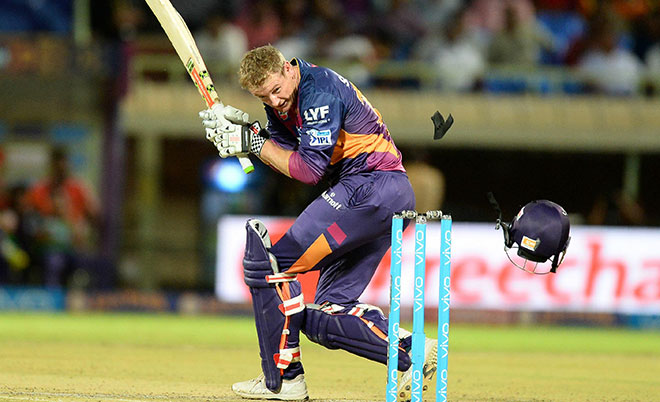 The helmet of rising Pune Supergiants batsman George Bailey  falls down after it was hit by a ball during the 2016 Indian Premier League (IPL) Twenty20 cricket match between Rising Pune Supergiants  and Delhi Daredevils at Dr. Y.S. Rajasekhara Reddy ACA-VDCA Cricket Stadium in Visakhapatnam on May 17, 2016. (AFP)