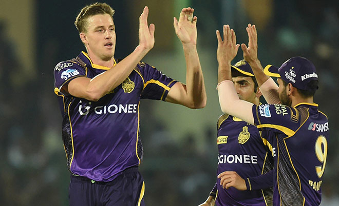 Kolkata Knight Riders' Morne Morkel (left) celebrates the wicket of Gujarat Lions Dinesh Karthik with teammates during the 2016 Indian Premier League (IPL) Twenty20 cricket match between Gujarat Lions and Kolkata Knight Riders at Green Park stadium in Kanpur on May 19, 2016. (AFP)