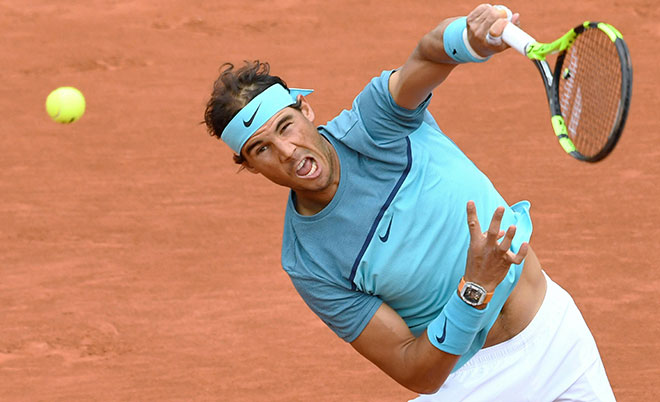 Spain's Rafael Nadal serves the ball to Australia's Samuel Groth during their men's first round match at the Roland Garros 2016 French Tennis Open in Paris on May 24, 2016. (AFP)