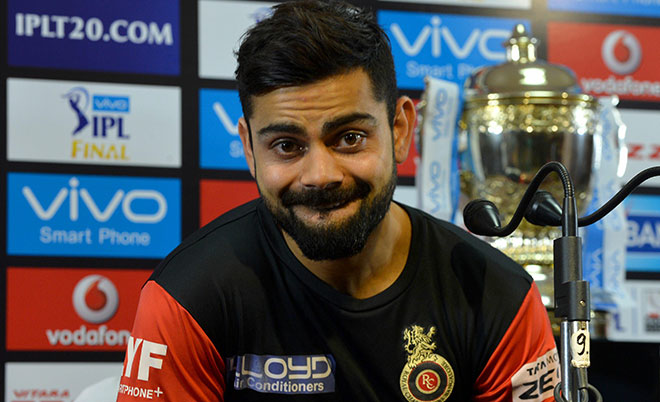 Royal Challengers Bangalore captain Virat Kohli gestures during a press conference after a practice session of the Royal Challengers Bangalore team at The M. Chinnaswamy Stadium in Bangalore on May 28, 2016. (AFP)