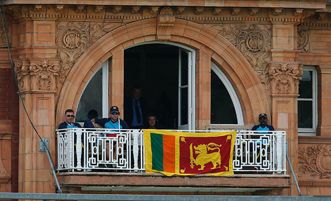 A flag is draped over the Sri Lanka balcony during play on the fourth day of the third test cricket match between England and Sri Lanka at Lord's cricket ground in London, on June 12, 2016. (AFP)