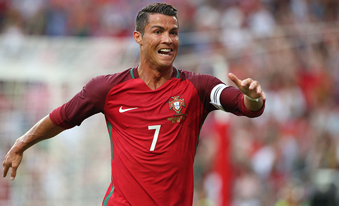 Portugal's forward Cristiano Ronaldo celebrates after scoring a goal during the International Friendly match between Portugal and Estonia at Estadio da Luz on June 8, 2016 in Lisbon, Portugal. (Getty Images)