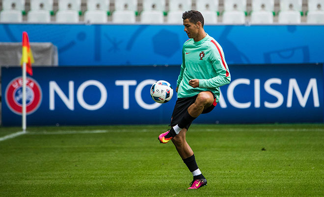Portugal's forward Cristiano Ronaldo controls the ball during a Euro 2016 training session at the Geoffroy-Guichard stadium in St Etienne on June 13, 2016 on the eve of their opening match against Portugal. (AFP)