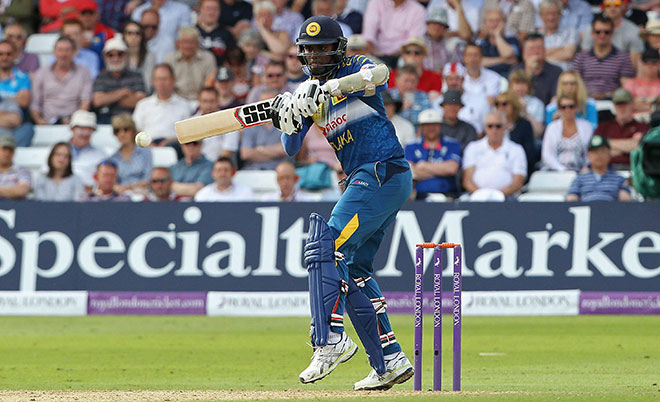 Sri Lanka's Farveez Maharoof plays a shot during play in the first one day international (ODI) cricket match between England and Sri Lanka at Trent Bridge cricket ground in Nottingham, central England, on June 21, 2016. (AFP)