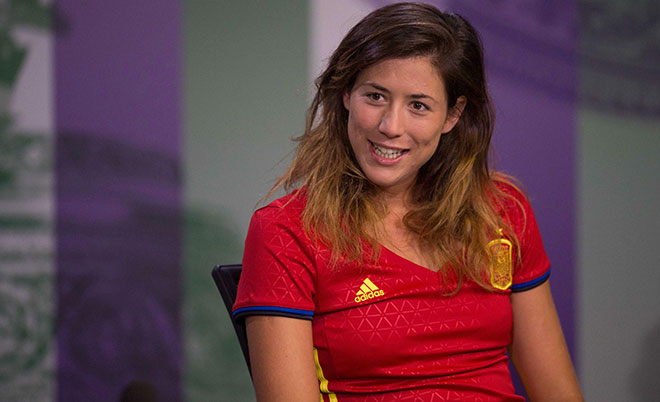 Spain's Garbine Muguruza gives her pre-Championships press conference at The All England Lawn Tennis Club in Wimbledon, southwest London, on June 25, 2016 on the eve of the start of the 2016 Wimbledon Championships tennis tournament. (AFP)