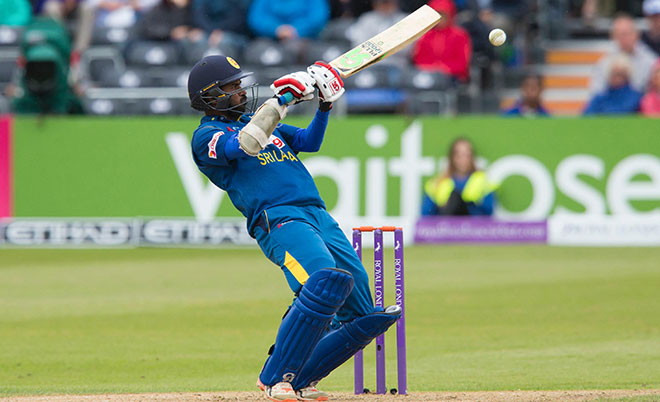 Sri Lanka's Upul Tharanga fends off a ball bowled by England's Liam Plunkett during play in the third one day international (ODI) cricket match between England and Sri Lanka at Bristol cricket ground in Bristol, south-west England, on June 26, 2016. (AFP)