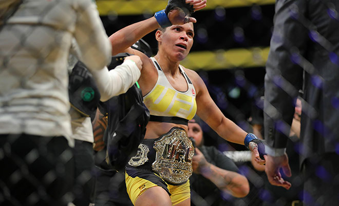 Amanda Nunes celebrates his victory over Miesha Tate during the UFC 200 event at T-Mobile Arena on July 9, 2016 in Las Vegas, Nevada. (AFP)