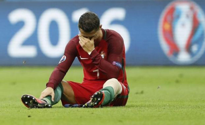 Portugal's Cristiano Ronaldo reacts after sustaining an injury. (Reuters)