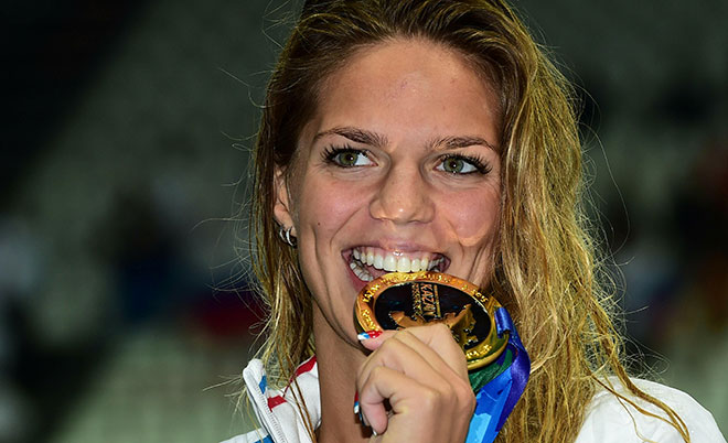 This file photo taken on August 04, 2015 shows Russia's Yuliya Efimova, gold, posing during the podium ceremony of the women's 100m breaststroke swimming event at the 2015 FINA World Championships in Kazan. (AFP)