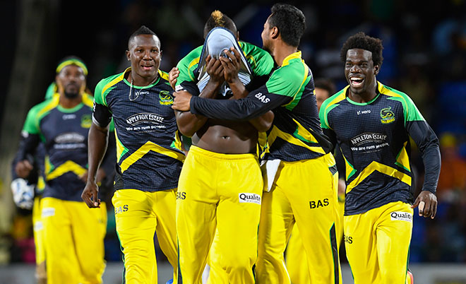 Andre Russell (centre) of Jamaica Tallawahs covers his face in celebration of Nic Maddinson of Guyana Amazon Warriors dismissal during Match 34 of the Hero Caribbean Premier League (CPL) &ndash; Final at Warner Park in Basseterre, St Kitts. (CPL/Sportsfile)