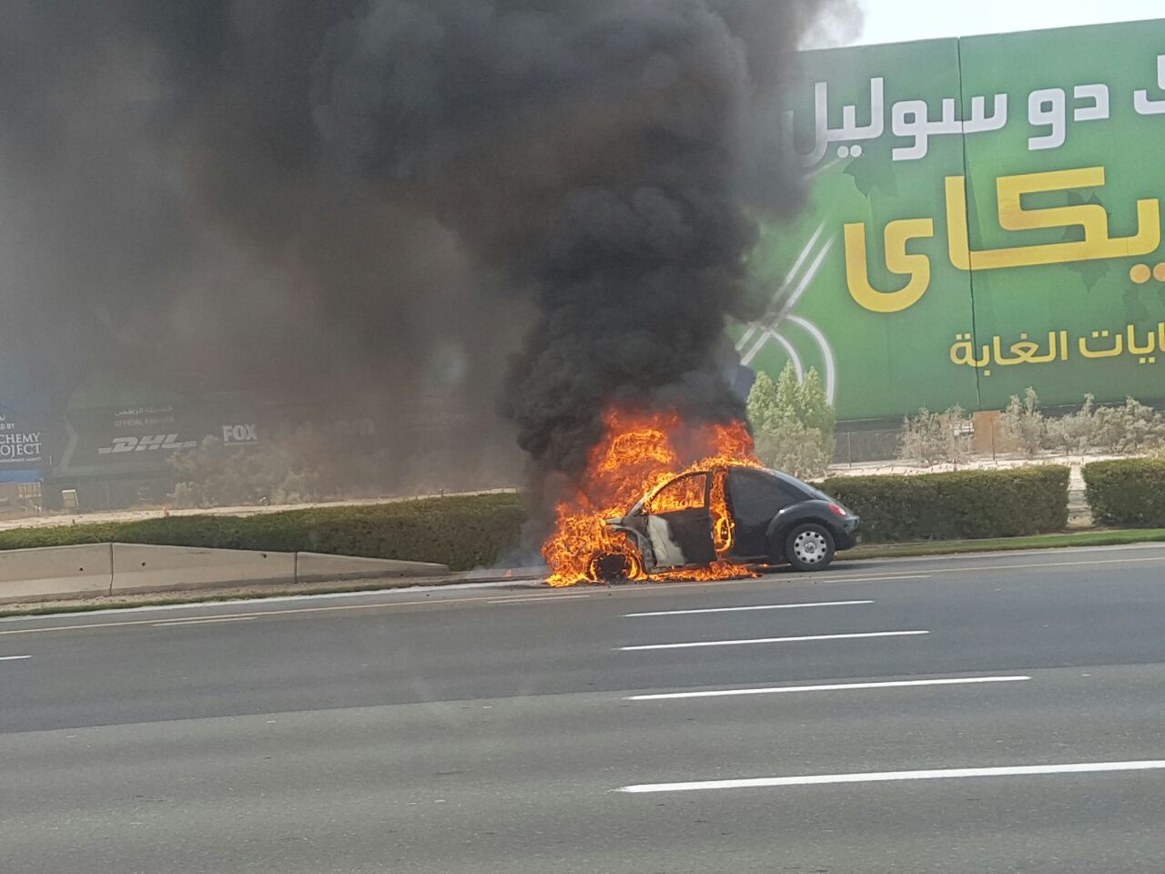 Volkswagen Beetle on fire on Sheikh Zayed Road near Al Barsha Salik gate