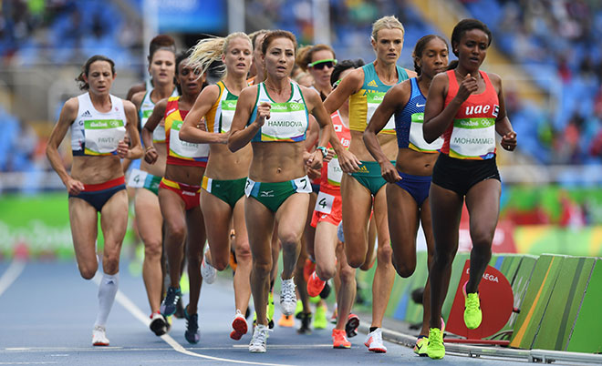 Sitora Hamidova of Uzbekistan and Alia Saeed Mohammed of United Arab Emirates lead a group in the Women's 10,000 metres final on Day 7 of the Rio 2016 Olympic Games at the Olympic Stadium on August 12, 2016 in Rio de Janeiro, Brazil. (Getty Images)