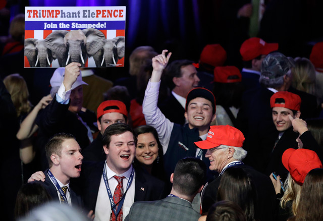 Supporters of Republican presidential candidate Donald Trump cheer as they watch the election results during Trump's election night. (AFP)