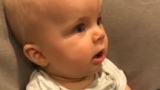 Photo: Baby hears dad play guitar for first time