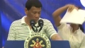 Photo: Philippine leader bugged by cockroach during speech