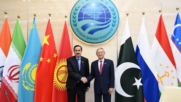 Photo: Saqr Ghobash meets with Secretary-General of Shanghai Cooperation Organisation