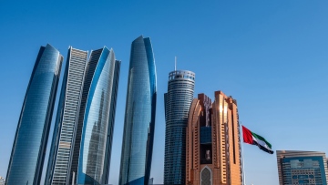 Photo: Debris from drones intercepted by air defence systems falls on fa&ccedil;ade of one of Etihad Towers buildings