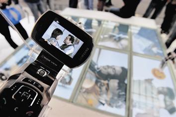 Mobile TV allows customers to view live TV channels on mobile handsets. (AFP)